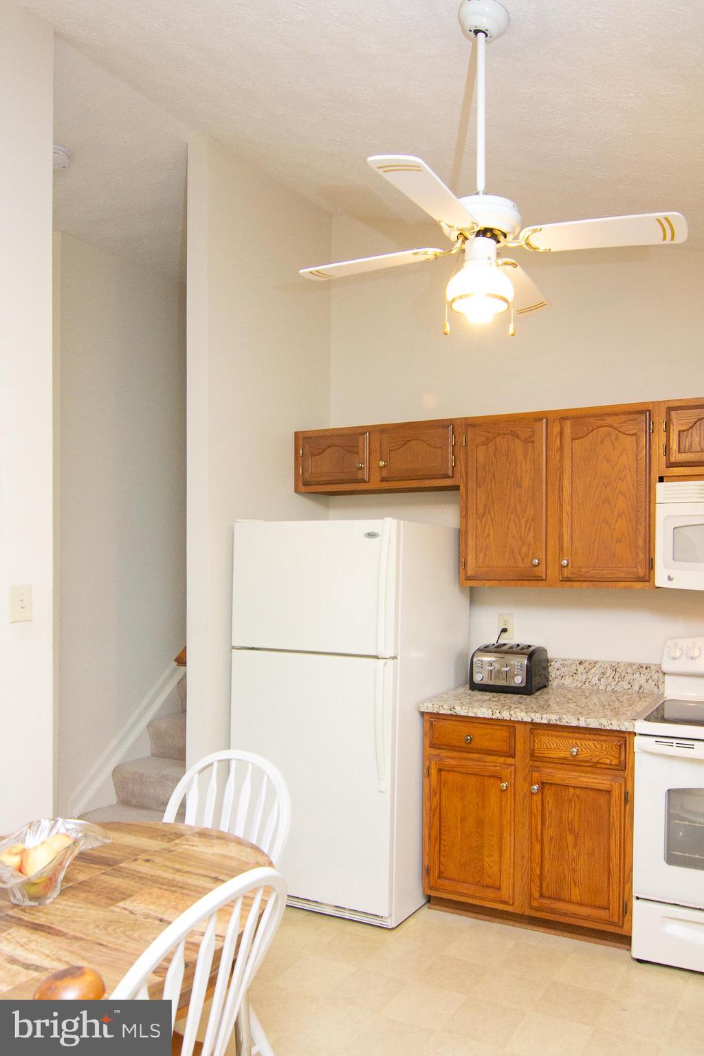 6683 Slacks Road Eldersburg, MD 21784 - Photo 11 of 37 Ceiling fan in kitchen