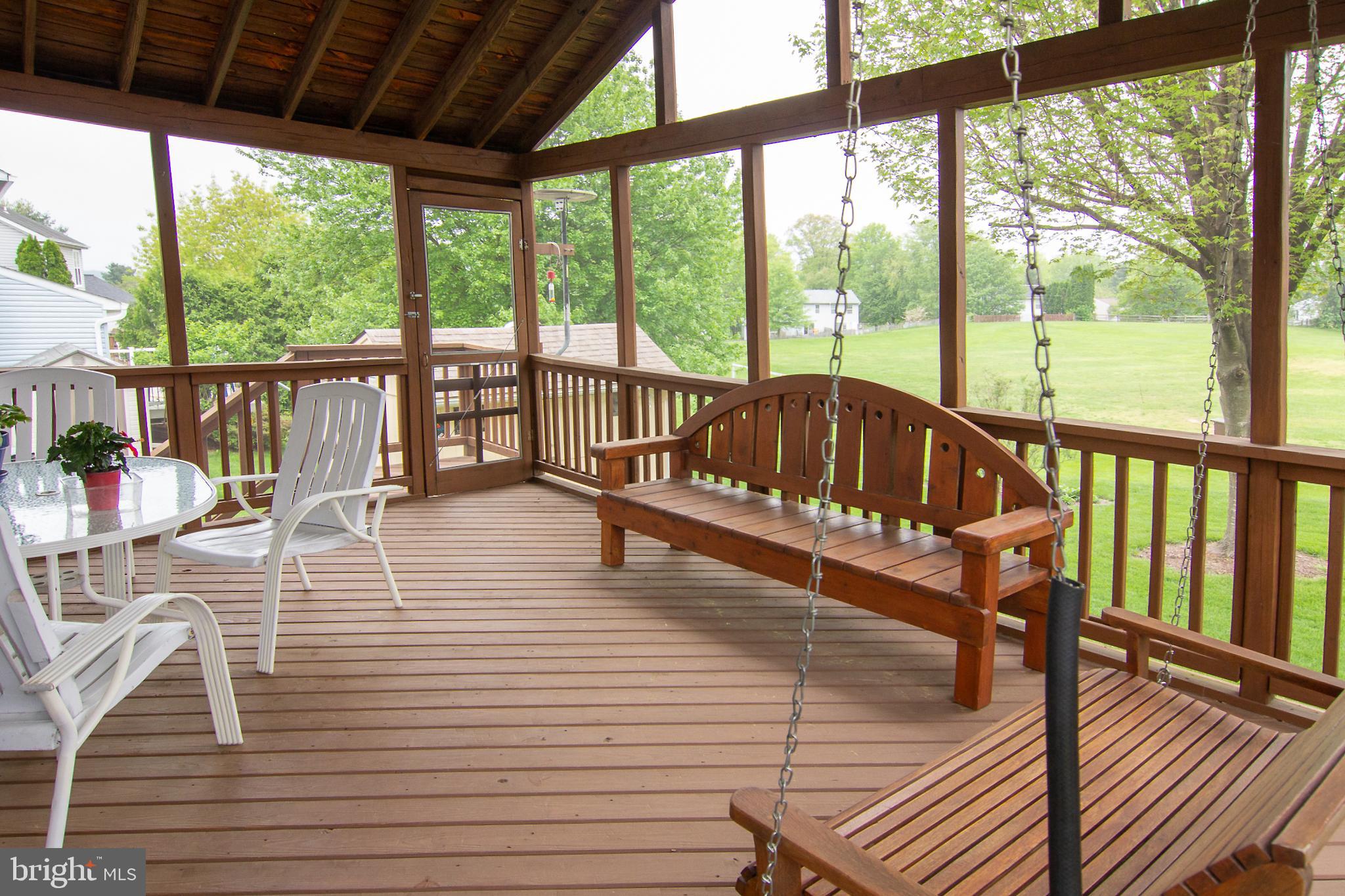 6683 Slacks Road Eldersburg, MD 21784 - Photo 17 of 37 12 X 18 screened porch with steps to yard