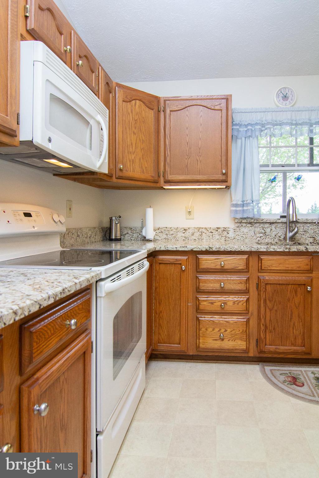 6683 Slacks Road Eldersburg, MD 21784 - Photo 10 of 37 Kitchen with glass top stove & built in microwave