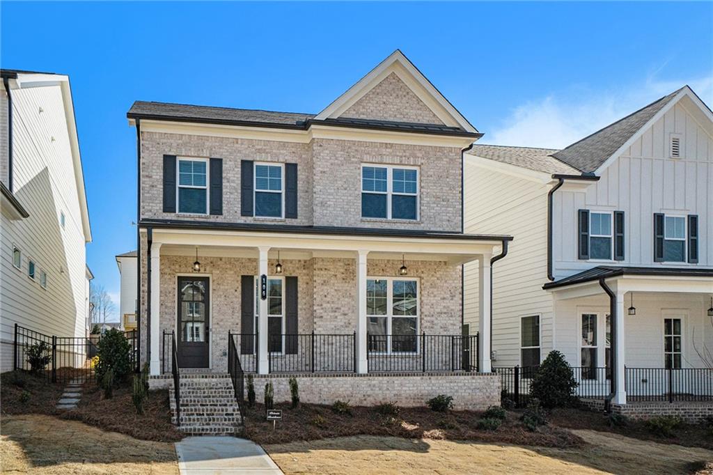 106 Basil Street Cumming, GA 30040 - Photo 24 of 25 a front view of a house