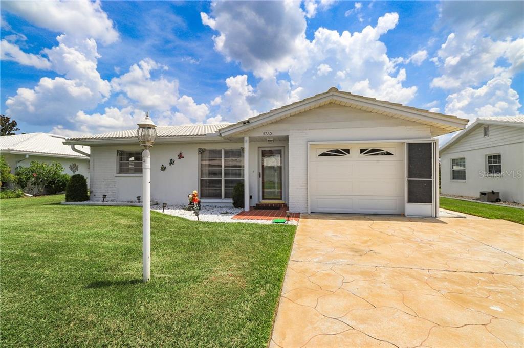 3710 Chinaberry Road Bradenton, FL 34208 - Photo 1 of 1 Welcome home! Very nice curb appeal greets you as soon as you arrive.