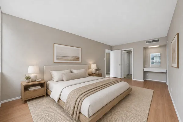 a bedroom with a bed and a night lamp