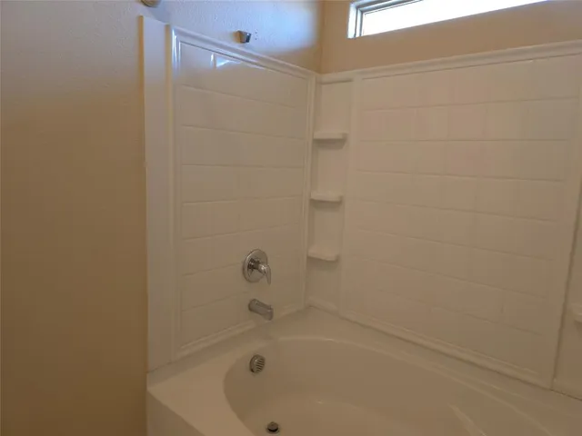 a bathroom with a tub