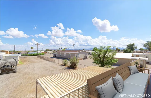 a view of a terrace with furniture