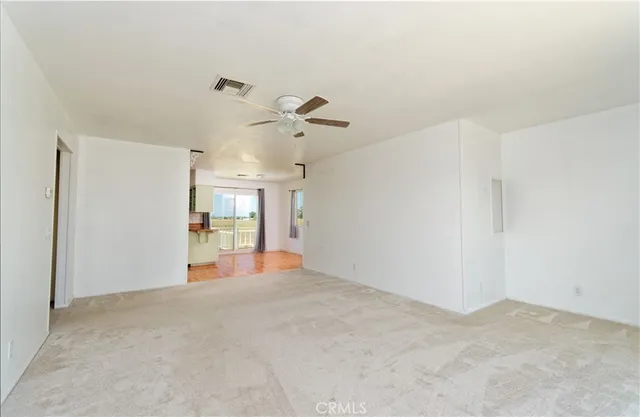a view of a livingroom with a fireplace