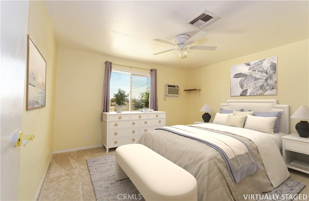 5501 Colorado River Road Blythe, CA 92225 - Photo 29 of 45 a bed room with a bed and a painting on the wall