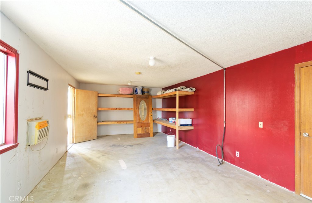 5501 Colorado River Road Blythe, CA 92225 - Photo 40 of 45 a view of a room with wooden wall and furniture