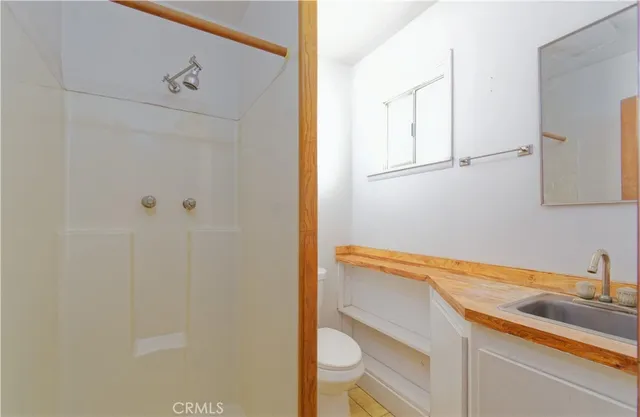 a view of a kitchen from the hallway