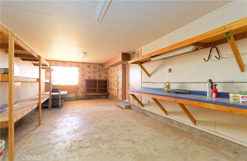 5501 Colorado River Road Blythe, CA 92225 - Photo 43 of 45 a view of a back yard with a patio and a slide