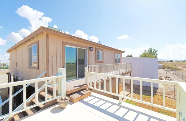 a view of a house with a balcony