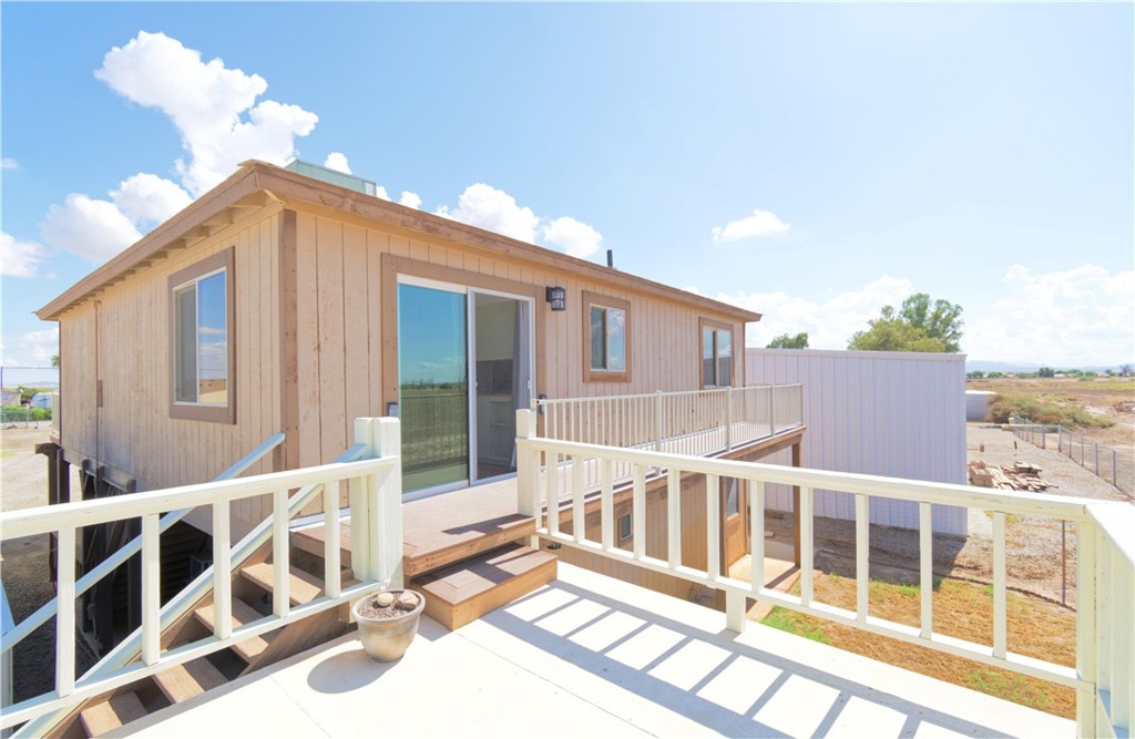 5501 Colorado River Road Blythe, CA 92225 - Photo 5 of 45 a view of a house with a balcony