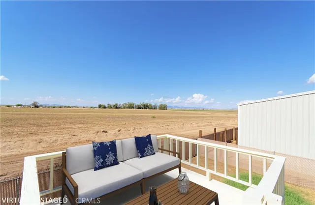 a view of a ocean from a deck