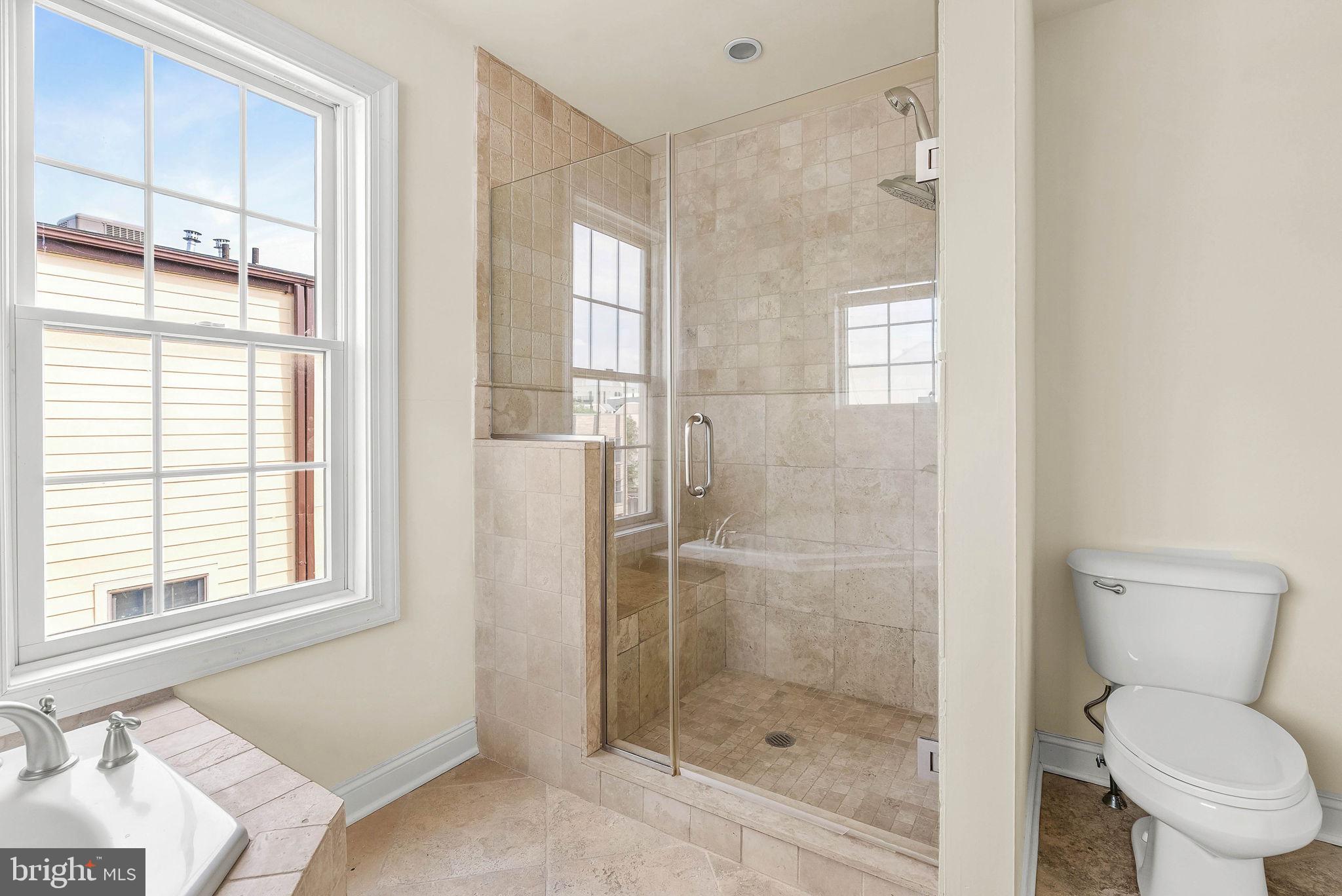 1015 North 3rd Street, Unit H Philadelphia, PA 19123 - Photo 15 of 27 a bathroom with a toilet and a shower