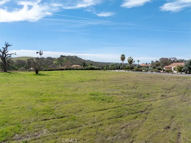 a view of a golf course with a garden