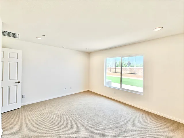 an empty room with a window