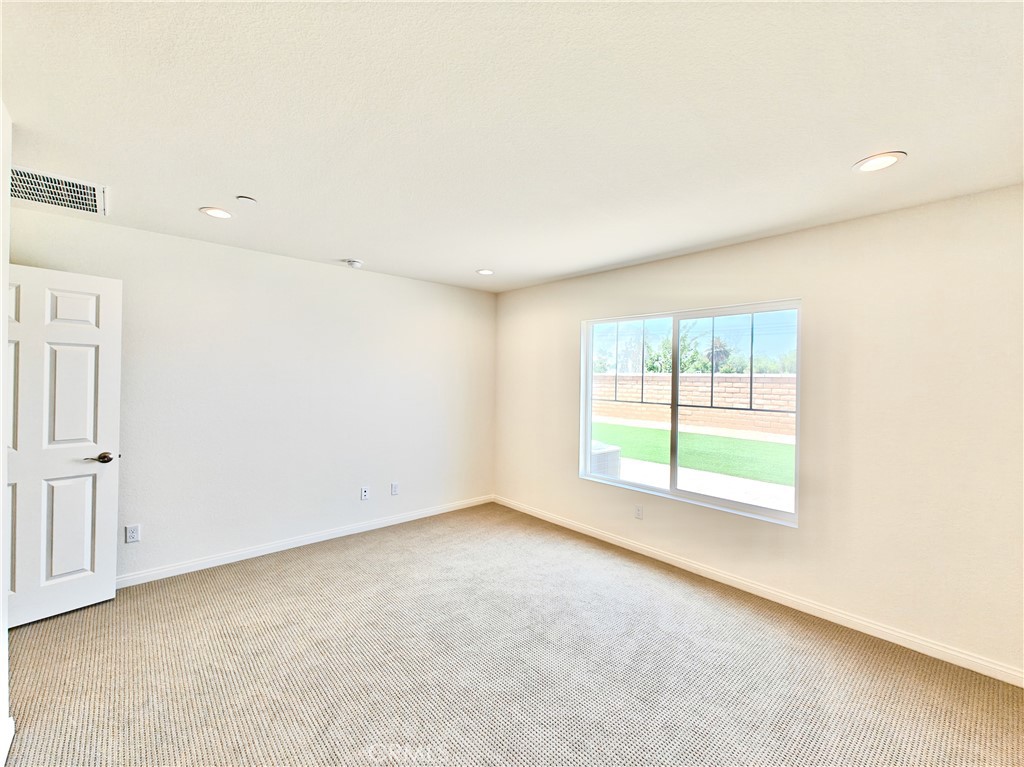20055 Lemonscent Drive Riverside, CA 92507 - Photo 11 of 19 an empty room with a window