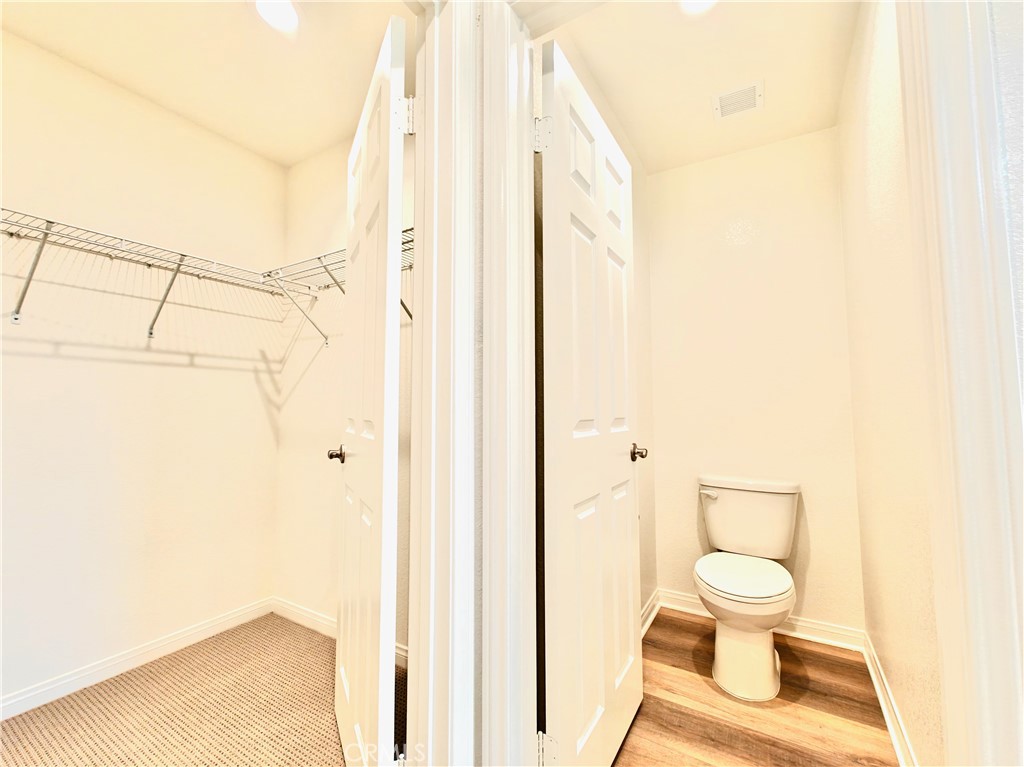 20055 Lemonscent Drive Riverside, CA 92507 - Photo 13 of 19 a bathroom with a toilet and a shower