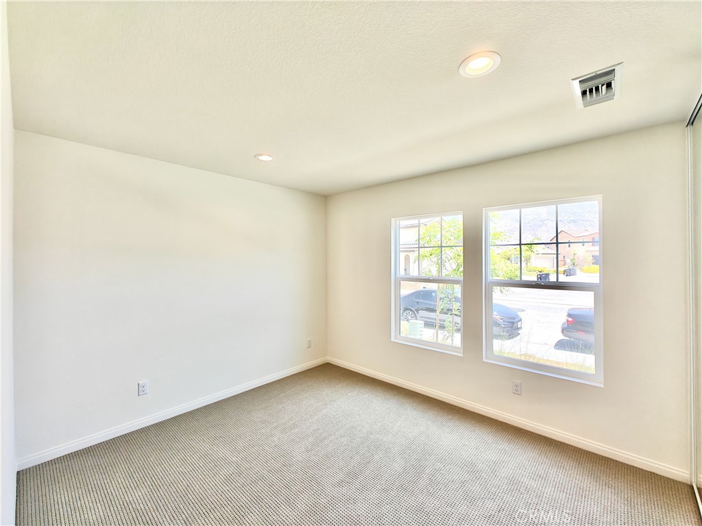 20055 Lemonscent Drive Riverside, CA 92507 - Photo 15 of 19 an empty room with windows