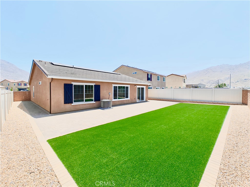 20055 Lemonscent Drive Riverside, CA 92507 - Photo 18 of 19 a front view of house with a garden