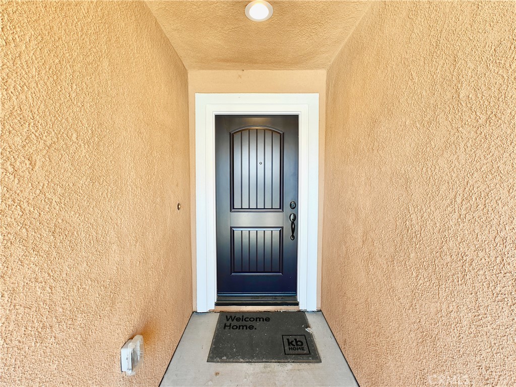 20055 Lemonscent Drive Riverside, CA 92507 - Photo 2 of 19 a view of front door with wooden floor