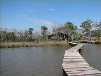 3613 Higgins Road Mobile, AL 36619 - Photo 9 of 22 A view back to the house from the dock