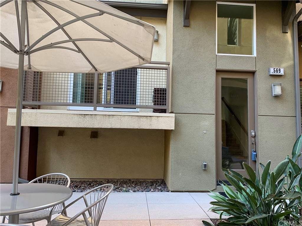 569 Rockefeller Irvine, CA 92612 - Photo 1 of 1 a view of a tree in front of a yard