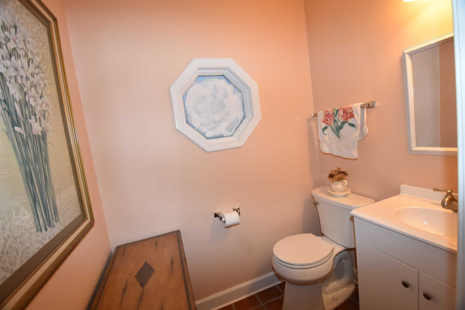 111 West Prairie Avenue Wheaton, IL 60187 - Photo 14 of 24 a bathroom with a toilet sink and mirror