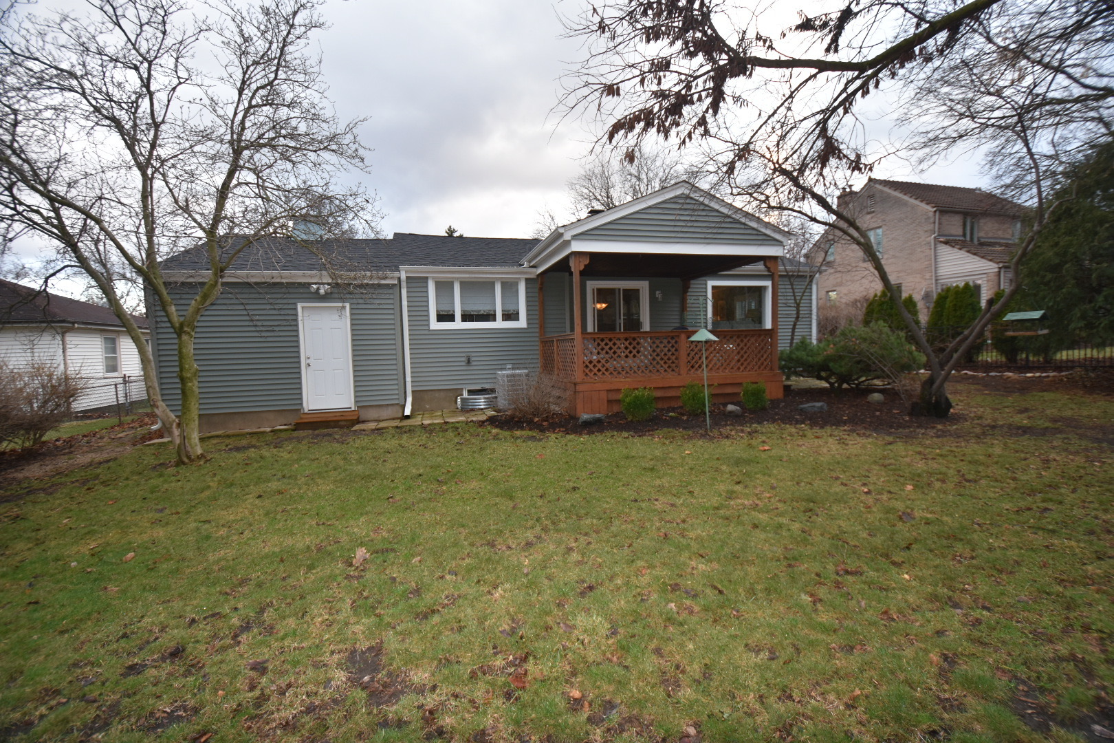 111 West Prairie Avenue Wheaton, IL 60187 - Photo 17 of 24 a front view of a house with garden