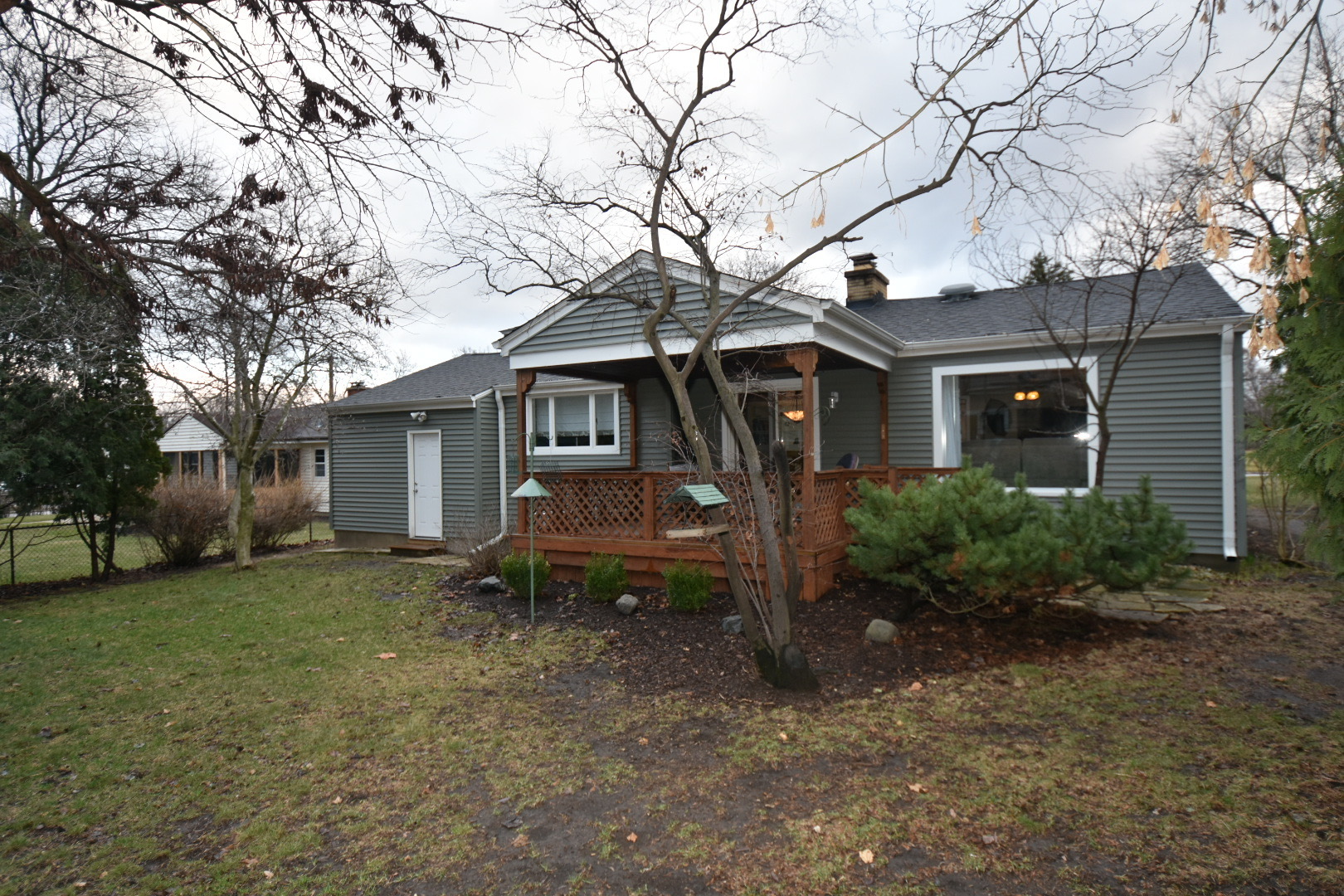 111 West Prairie Avenue Wheaton, IL 60187 - Photo 18 of 24 a front view of a house with garden