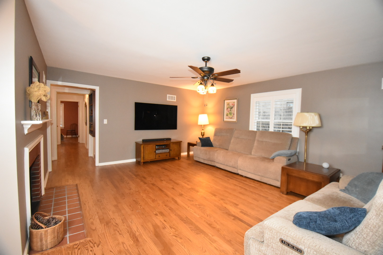 111 West Prairie Avenue Wheaton, IL 60187 - Photo 5 of 24 a living room with furniture and a flat screen tv