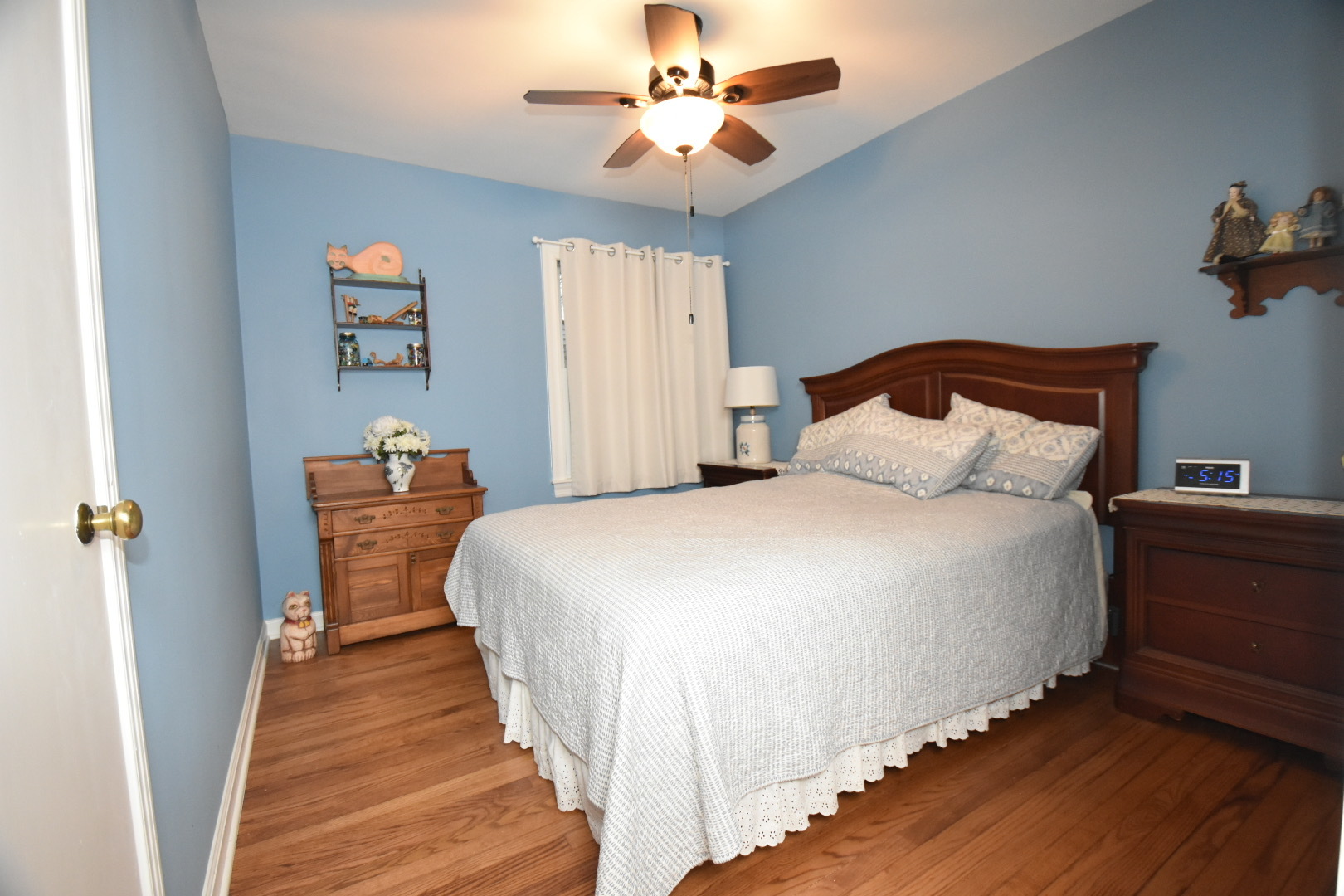 111 West Prairie Avenue Wheaton, IL 60187 - Photo 9 of 24 a bedroom with bed and wooden floor