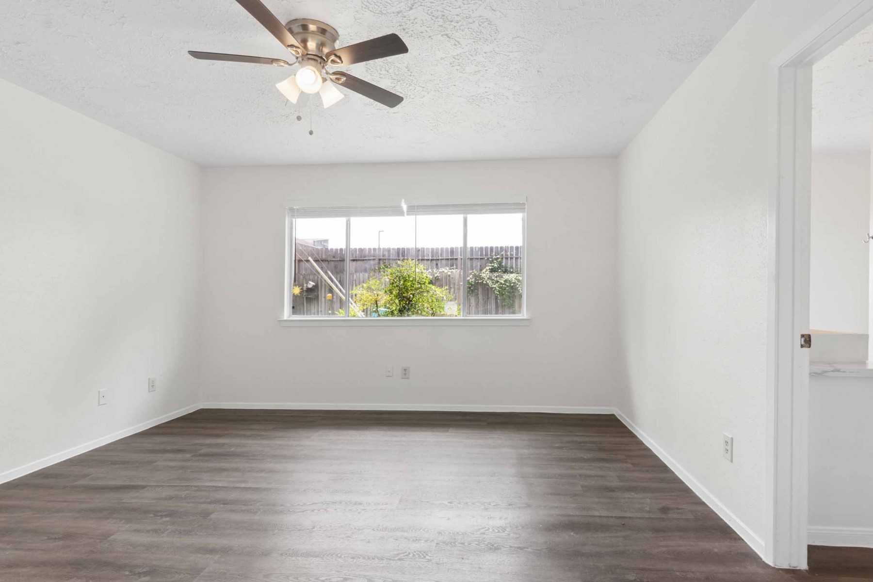 10411 Rabbit Oak Drive Houston, TX 77065 - Photo 15 of 22 Primary bedroom features a large window overlooking the private backyard.