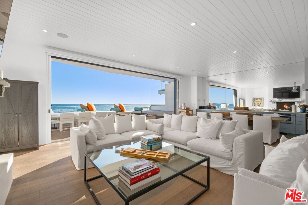 27212 Escondido Beach Road Malibu, CA 90265 - Photo 7 of 35 a living room with furniture kitchen view and a table