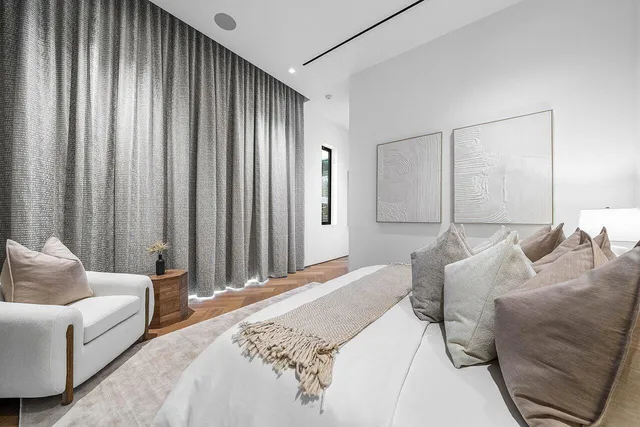 an aerial view of a city with lots of residential buildings