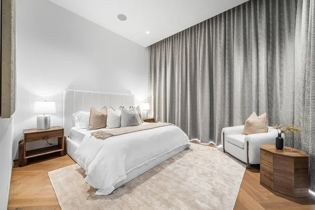 a swimming pool with outdoor seating