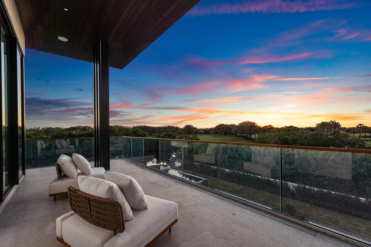 126 Spinnaker Lane Jupiter, FL 33477 - Photo 69 of 96 a view of roof deck with couches and wooden floor