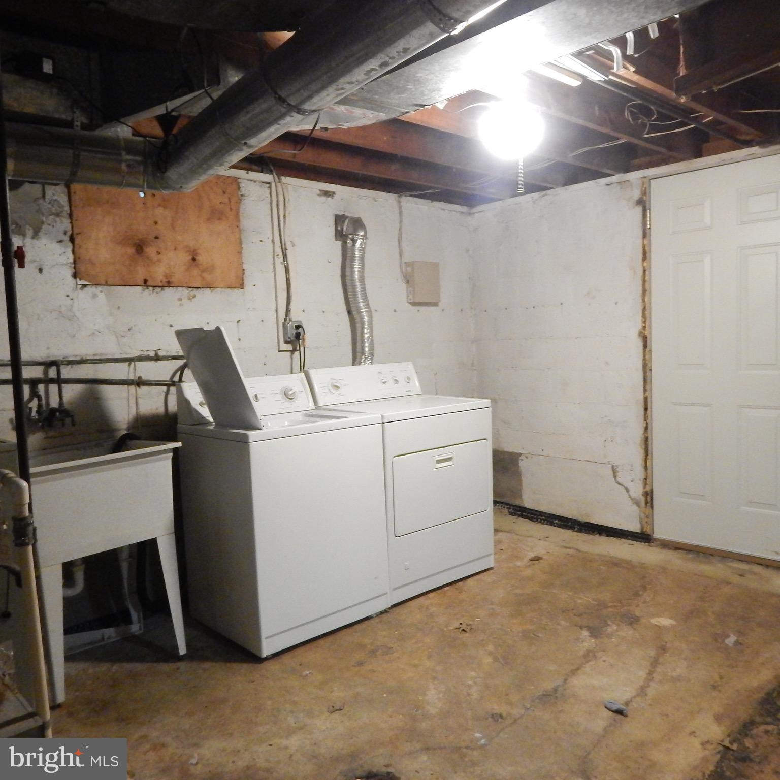7229 East Forest Road Landover, MD 20785 - Photo 13 of 18 Laundry / utility room with exit to side yard