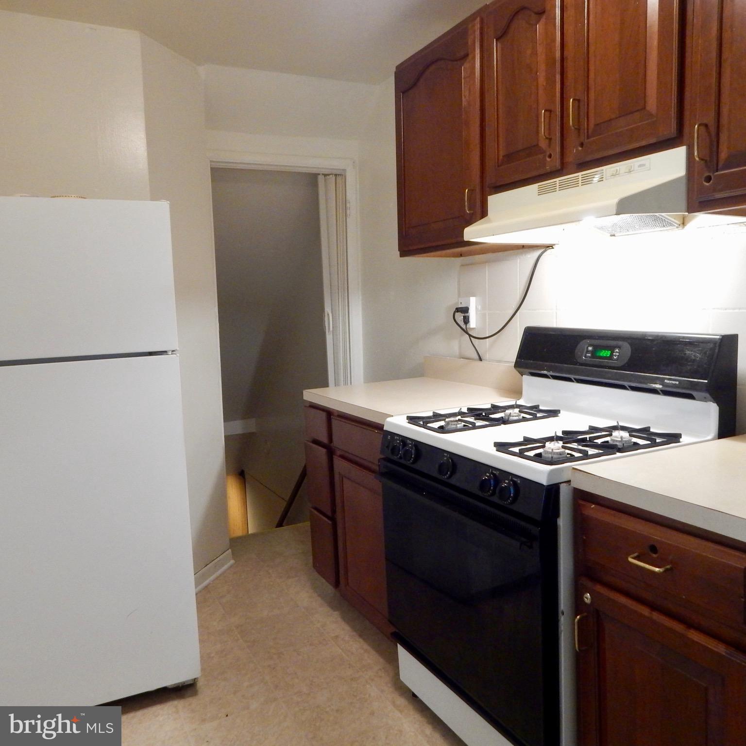 Kitchen gorger cherry wood cabinets