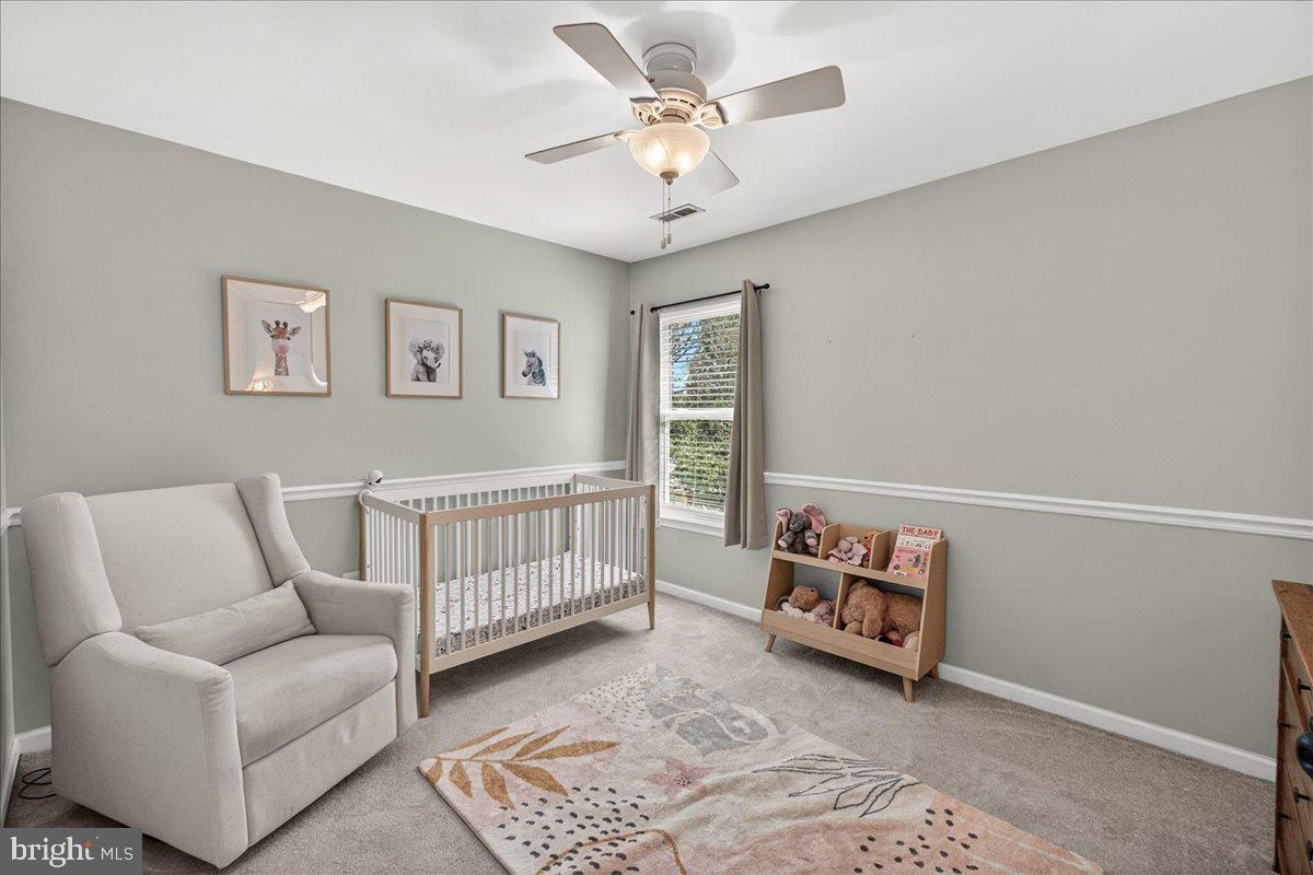 98 Pleasanton Court Frederick, MD 21702 - Photo 28 of 62 a bedroom with furniture and a couch