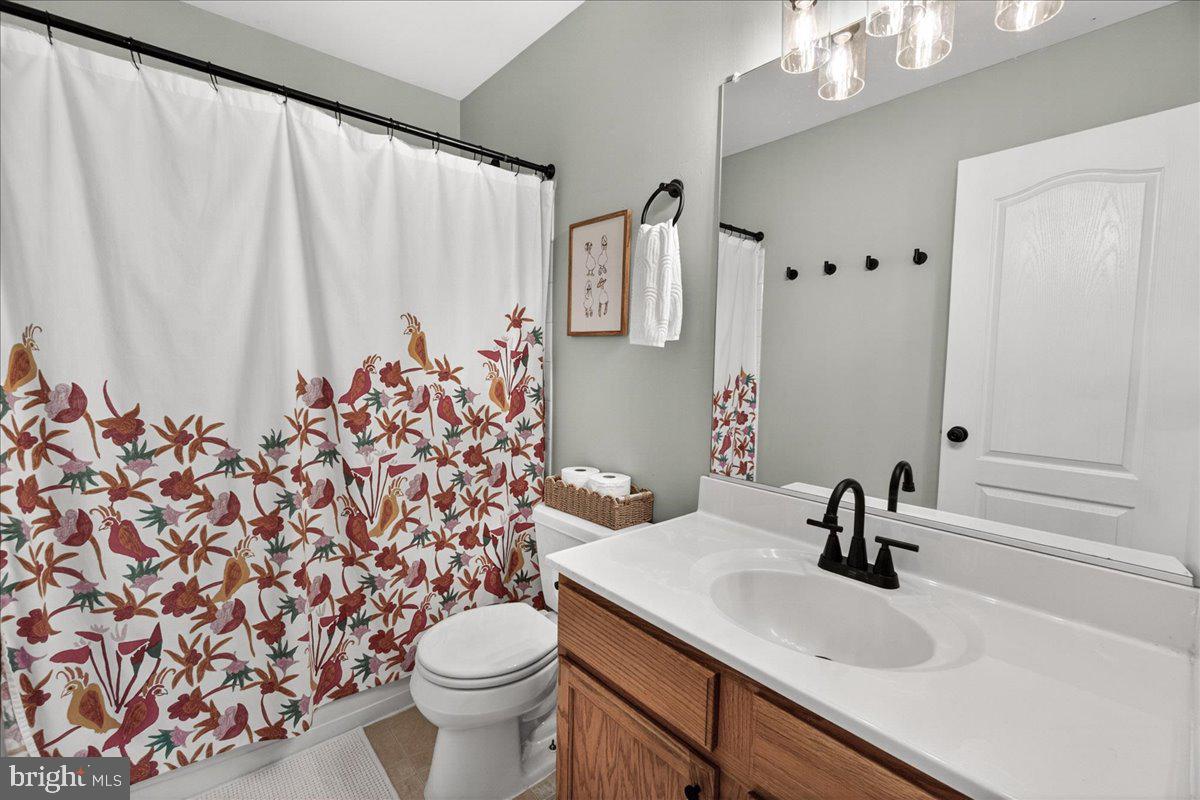 98 Pleasanton Court Frederick, MD 21702 - Photo 31 of 62 a bathroom with a sink and a toilet