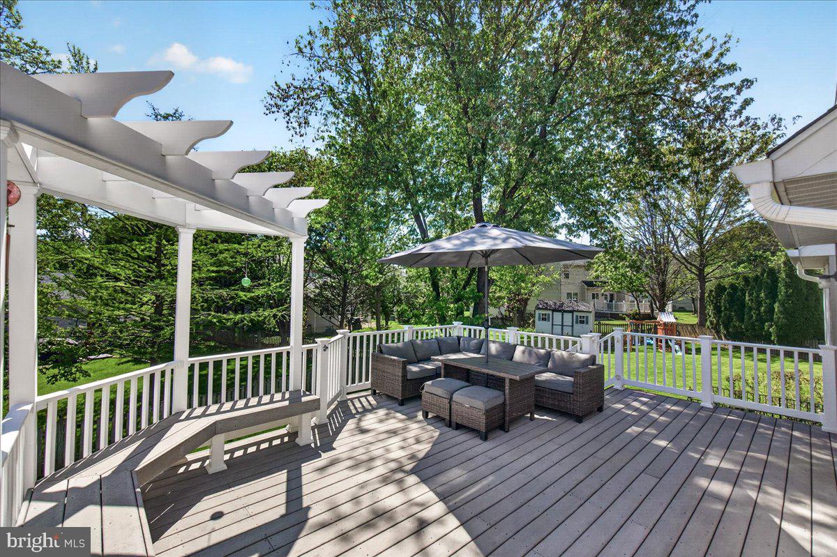 98 Pleasanton Court Frederick, MD 21702 - Photo 36 of 62 a view of a patio with furniture and backyard
