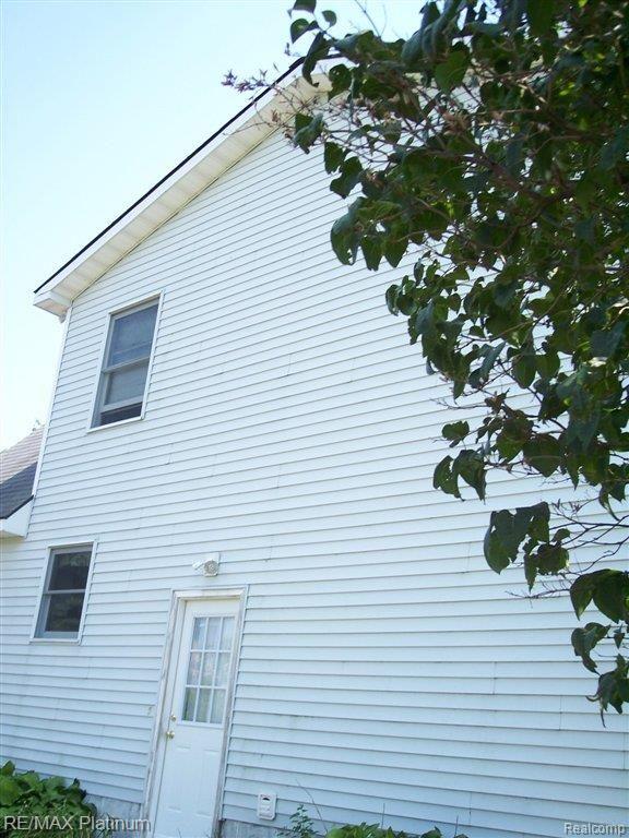 2365 Fowlerville Road Fowlerville, MI 48836 - Photo 19 of 25 SIDE