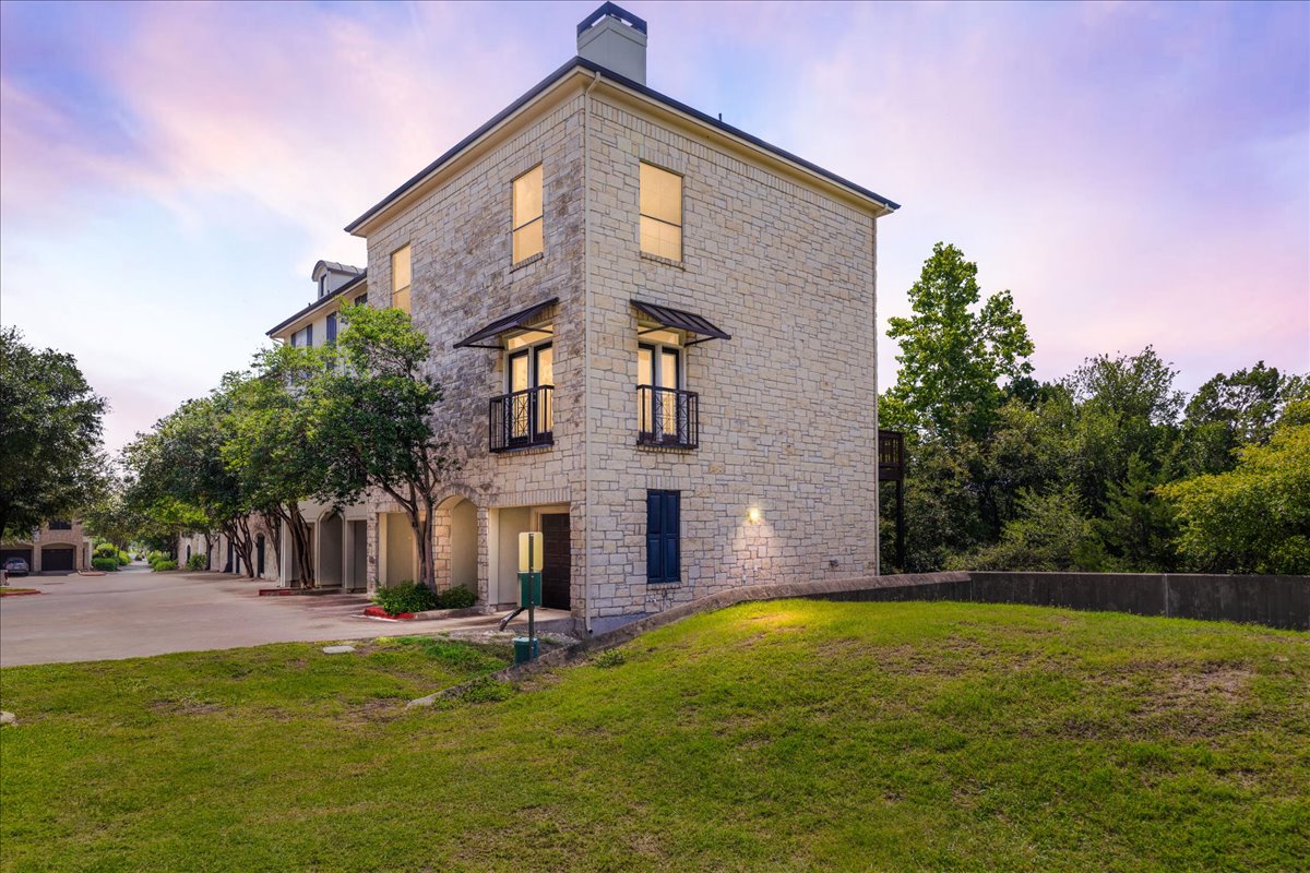 7701 Rialto Boulevard, Unit 91 Austin, TX 78735 - Photo 1 of 39 a view of a house with swimming pool