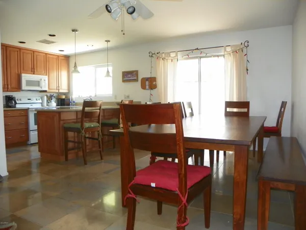 a view of a dining room with furniture