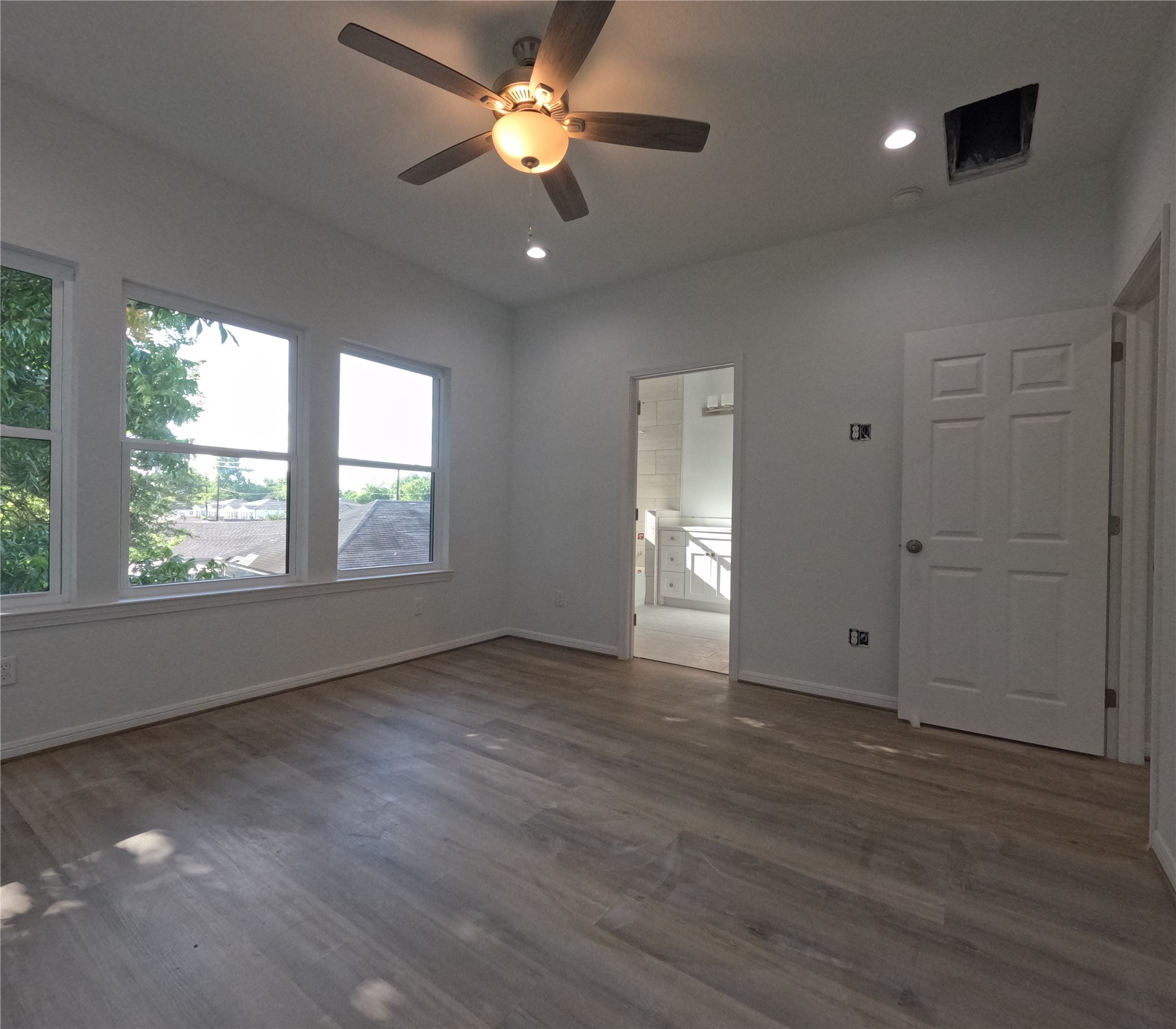 9427 Coffee Street Houston, TX 77033 - Photo 19 of 23 Primary Bedroom looking towards bathroom