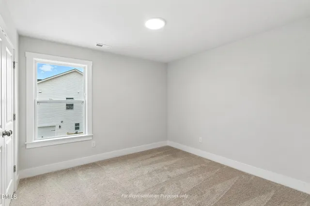 a bathroom with a double vanity sink and mirror