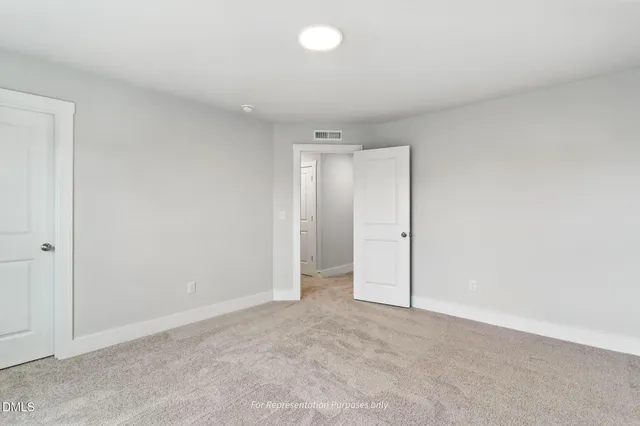 a bathroom with a shower and a sink