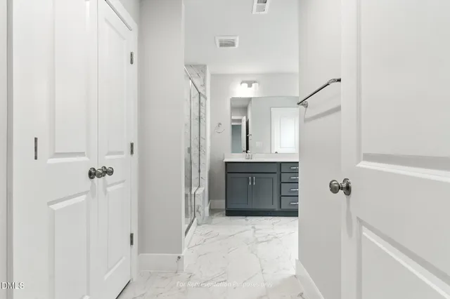 a view of a lake with sitting area