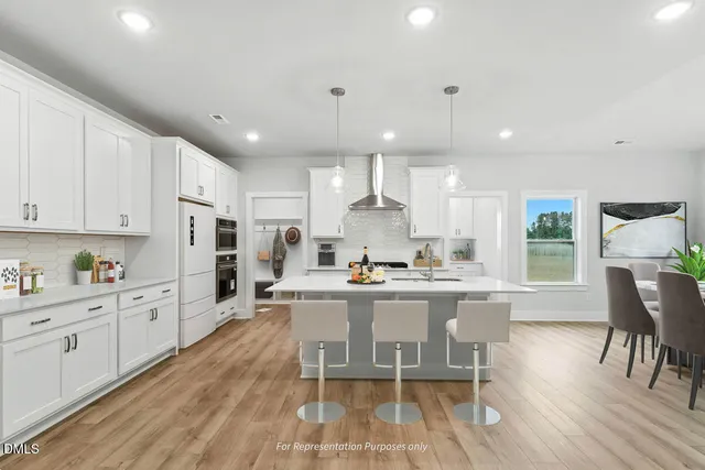 a view of cabinets with wooden floor