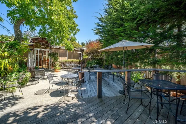 a bathroom with a toilet a sink and a mirror